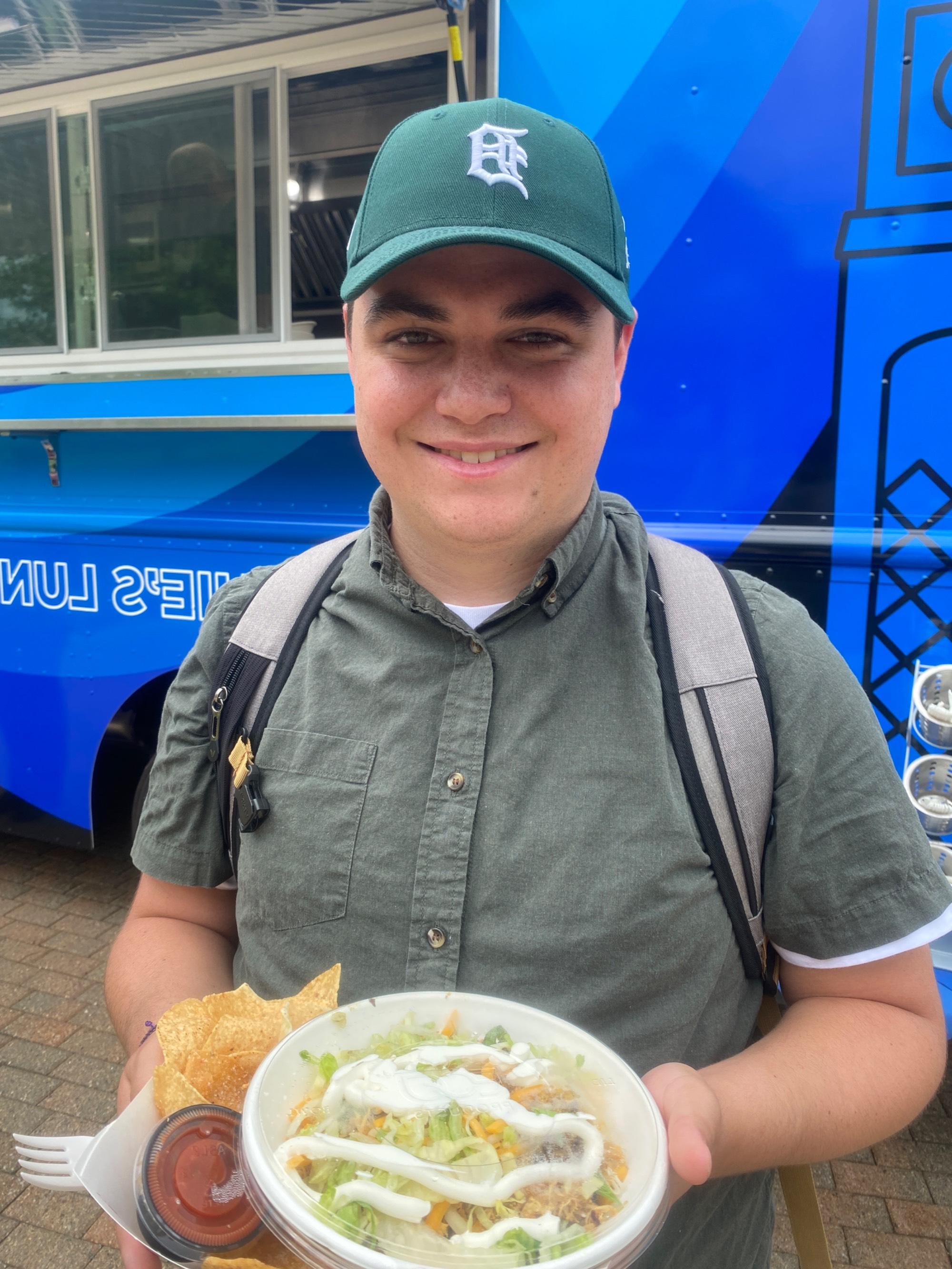 student with burrito bowl